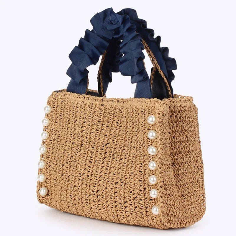 Women's bohemian woven straw beach tote, front view